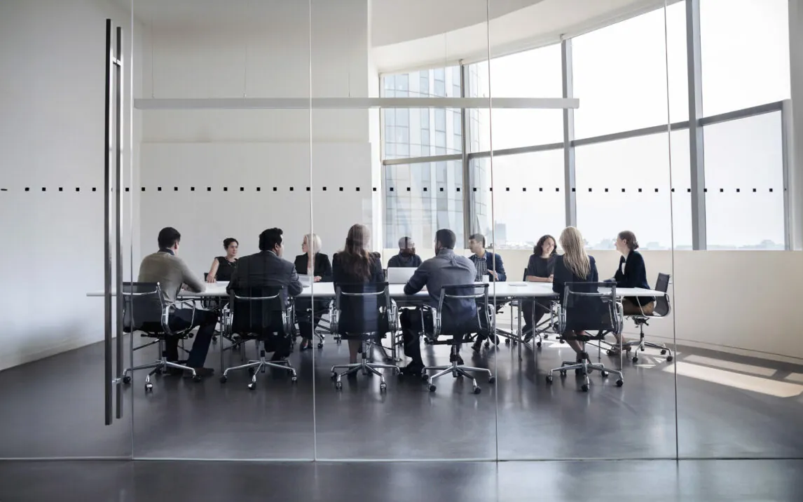 colleagues-at-business-meeting-in-conference-room-618946910 Colleagues at business meeting in conference room