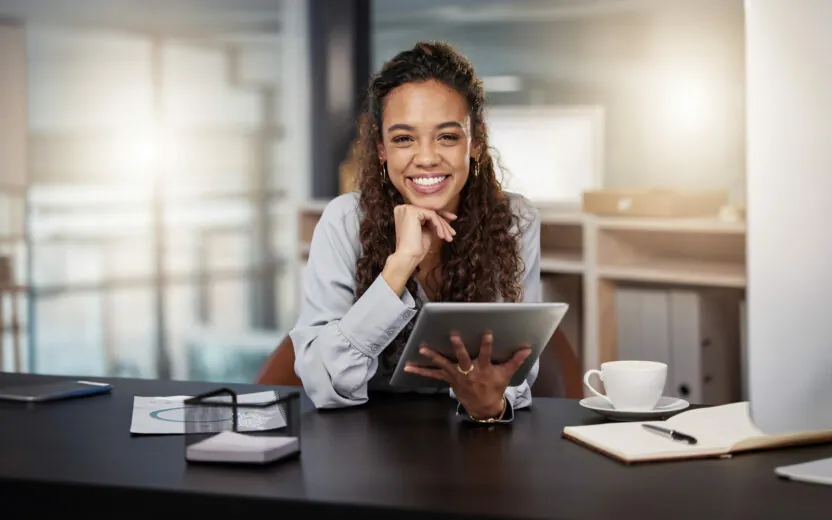 shot-of-a-young-businesswoman-using-a-digital-tablet-1365606632 Shot of a young woman using a tablet at work