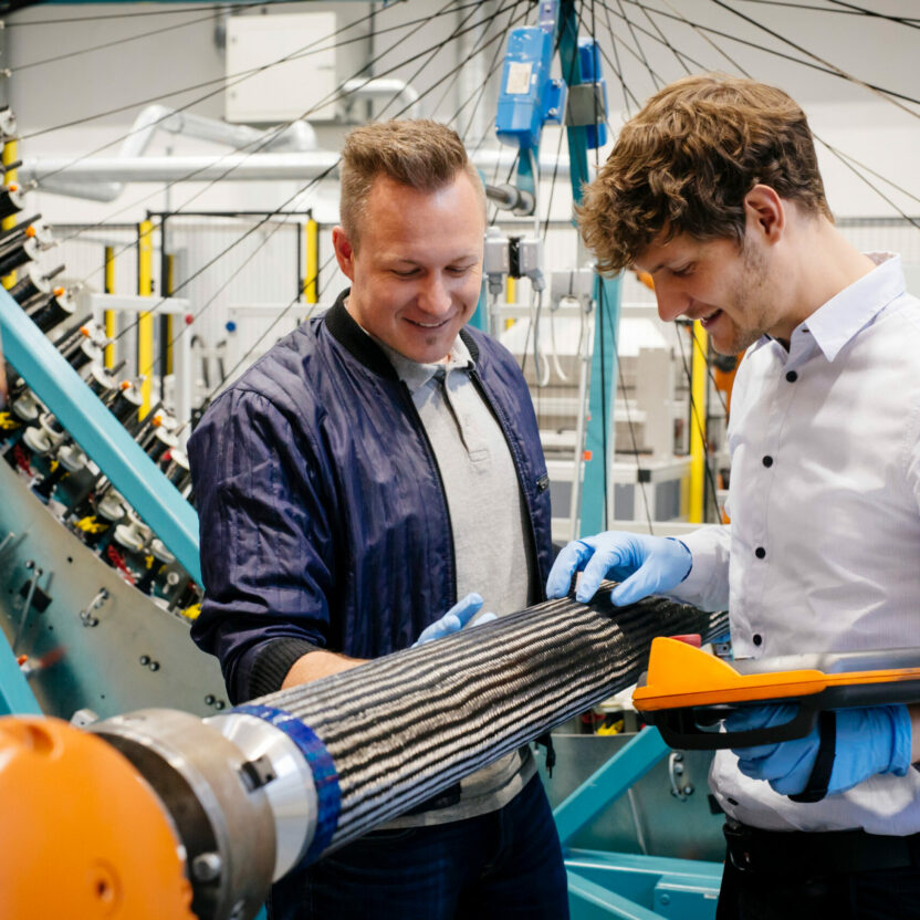 Employees of SGL Carbon checking carbon fibers Employees of SGL Carbon checking carbon fibers